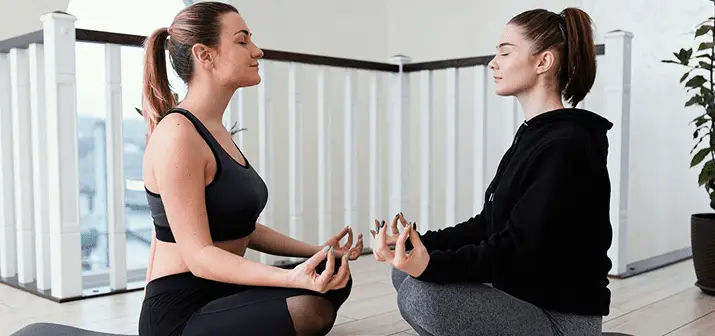 Therapist guiding a client through a mindfulness exercise