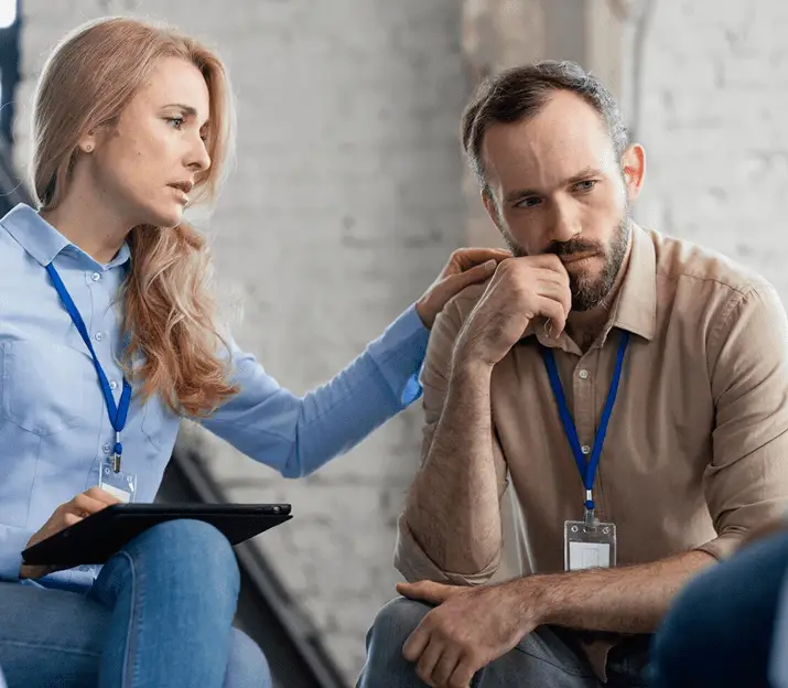 Therapist providing support during an individual trauma counseling session